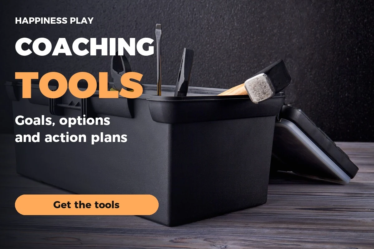 Open toolbox with tools and the title Coaching tools, goals, options and action plans